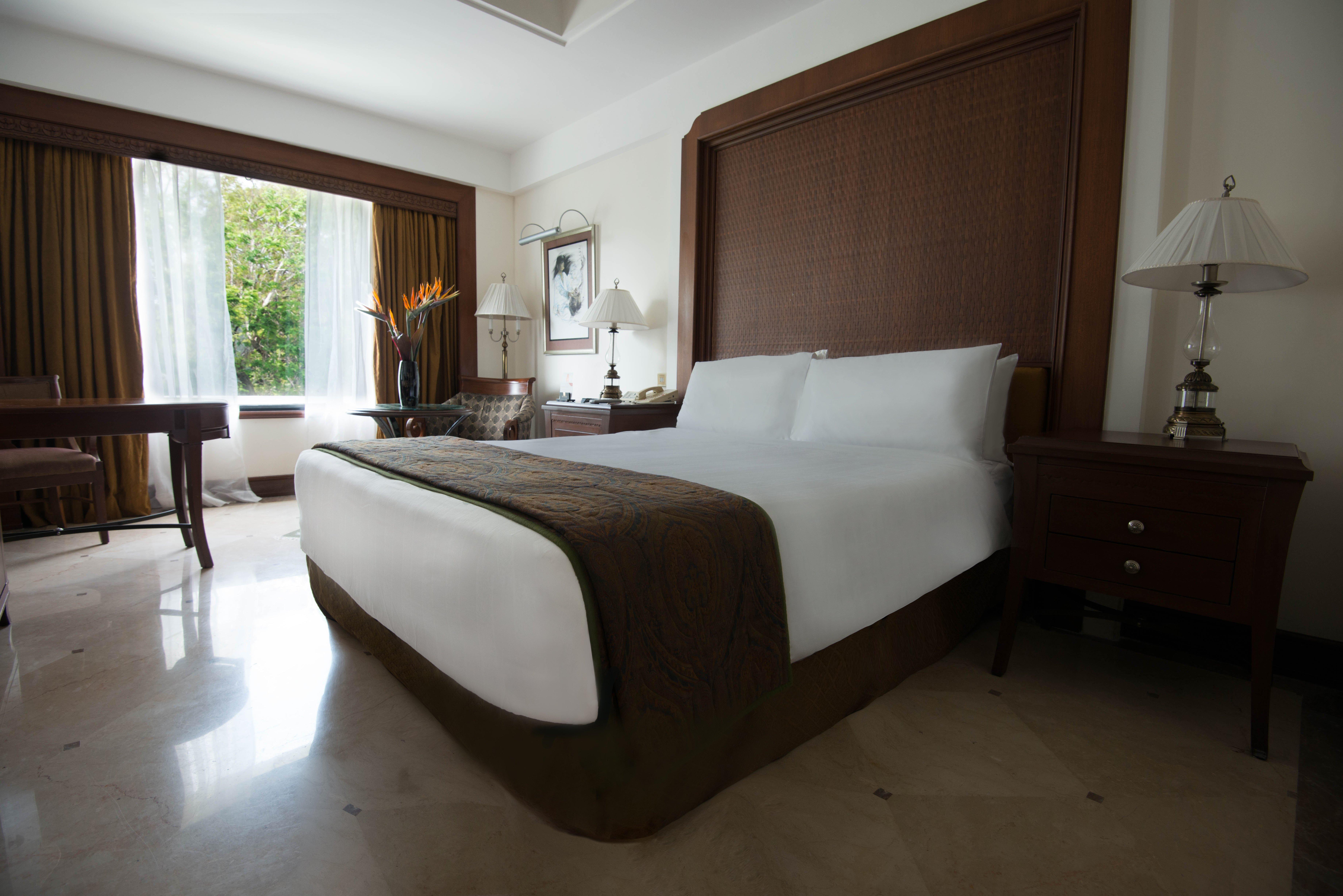 Crowne Plaza Chennai Adyar Park, An Ihg Hotel Buitenkant foto A bedroom at the Taj Bengal